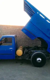 نیسان کمپرسی حمل خاک نخاله همراه با دوکارگر ماهر