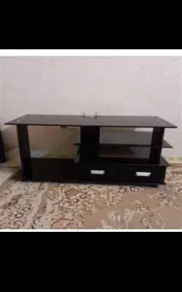 میز زیر تلویزیون شیشه ای