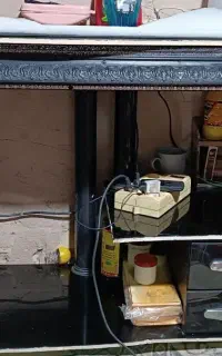 میز تلویزیون شیشه‌ای