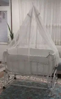 تخت گهواره ای کودک