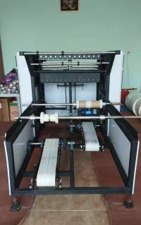 دستگاه رول کن سفره یکبار مصرف