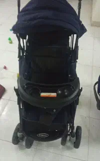 کالسکه بچه در حد نو‌وسالم همراه با کریر