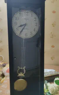 ساعت دیواری پاندول دار کشابدار