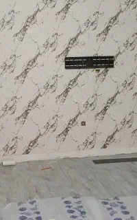 نصاب کاغذ دیواری