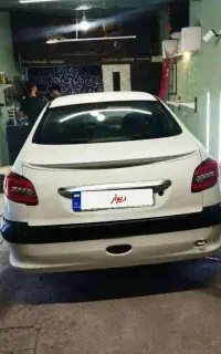 ماشین 206SD سفید تمیز مرتب