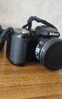 دوربین نیکون L110  با  سه پایه
