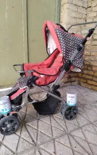 کالسکه و قوطی  خالی