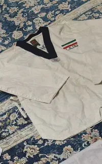 لباس و کمربند تکواندووکفش کشتی سایز۳۶