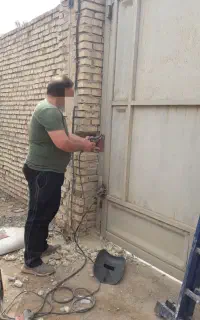 تعمیرات و نصب انواع جک بازویی درب پارکینگ