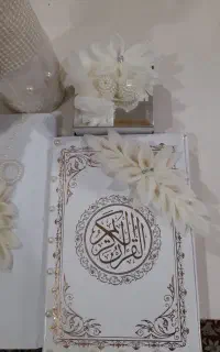 کله قند و قران .وجا حلقه همراه با دسته گل
