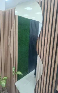 اینه دفرمه با چوب پشت