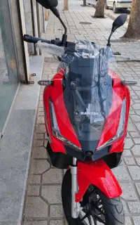 همتاز adv