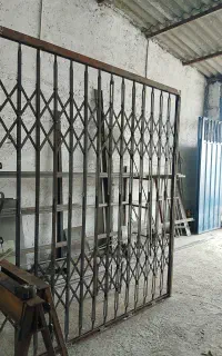 اتاق سازی نیسان درب آکاردئون خدمات جوشکاری ساختمان