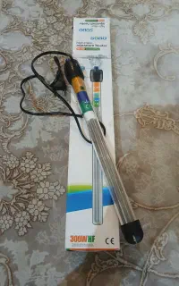 دو تا بخاری اکواریوم و یک عدد لامپ اکواریوم