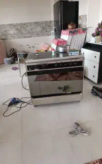 اجاق گاز تمام استیل سینجر فر دار میباشد