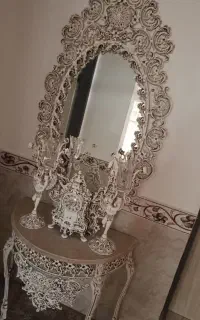 آینه شمعدان و ساعت