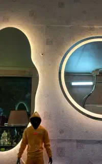 اینه گرد و‌ دفورمه قدی العیدی دار
