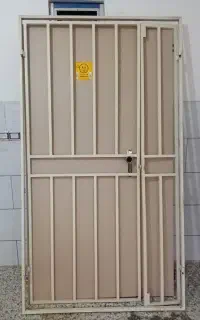 درب چوبی ورودی همراه باحفاظ فلزی