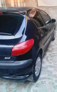 خودرو۲۰۶ مشکی آخر۹۳