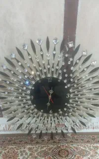 ساعت دیواری مدل خورشیدی