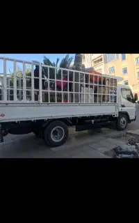 خدمات اسباب کشی کارگر ماهر شش چرخ بزرگ باربری کیش