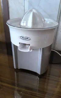 اب پرتقال گیری خانگی