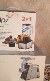 چرخ گوشت و مخلوط کن نو توی کارتون