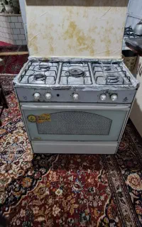 اجاق گاز طرح فر باترموکوبل ودرب کشویی دارای طبقه