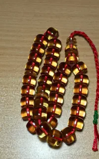تسبیح سندلوس زرد نباتی (مهر دار )
