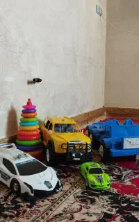 ماشین و اسباب بازی معاوضه با سه چرخه دو چرخه