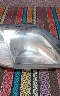 چراغ سمت راست جلو ال ۹۰ و چراغ چپ جلو تیبا ۲