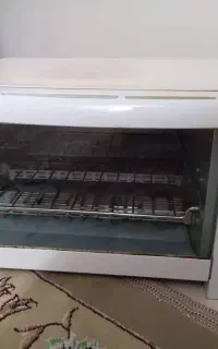 تنورک بخارپز و مینی توستر سانی سفید