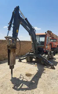 مینی بیل چرخ لاستیکی