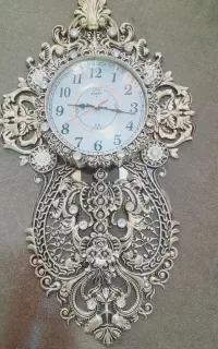 ساعت دیواری طلایی