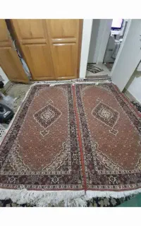 فرش دست باف ریزماهی  زمینه مسی قرمز رنگ