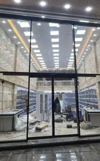 تعمیرات وفروش درب اتوماتیک وکرکره برقی وشیشه میرال
