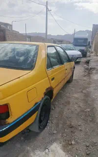 پژو تاکسی زرد