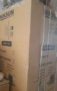 یخچال و فریزر کمبی نیکسان فریزر پایین پلمپ و آکبند