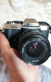 دوربین nikonمدلfm10لنز۲۵میلیمتری