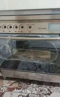 اجاق گاز فر دار تکنو تمام استیل