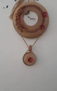 ساعت دیواری کوزه ای