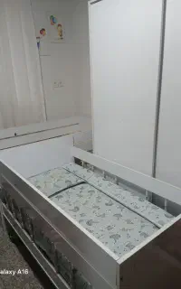 تخت کودک همراه باتشک سالم وروکش وبالش