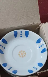 بشقاب چای و چاقو میوه
