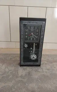ساعت دیواری (پاندول دار)