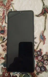گوشی ردمیa03
