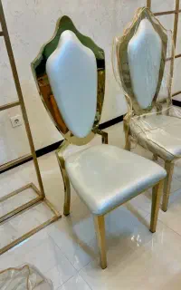 صندلی سلطنتی چرم و استیل طلایی