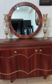 آیینه کنسول و شمعدانی ها