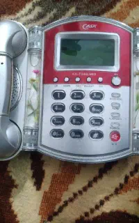 یک عددتلفن رومیزی منزل