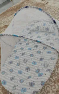 تور پشه بند و ساک حمل نوزاد