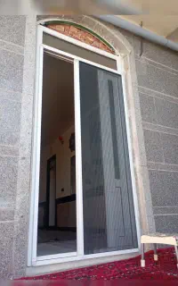 فروش ونصب توری کشوی وریگلاج درب وپنچره PVC